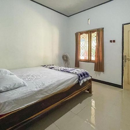Ekas Beach Guesthouse Mitra Reddoorz ภายนอก รูปภาพ