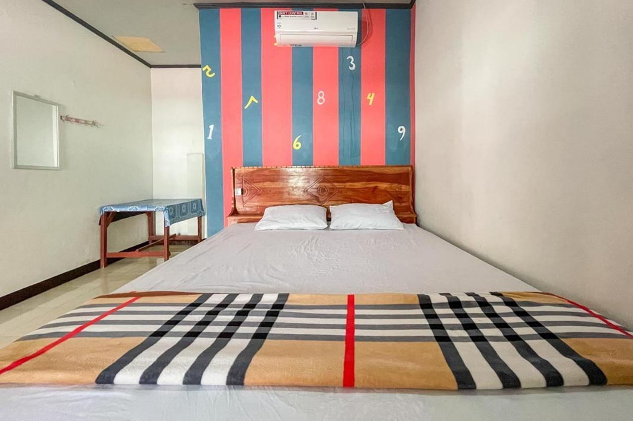 Ekas Beach Guesthouse Mitra Reddoorz ภายนอก รูปภาพ