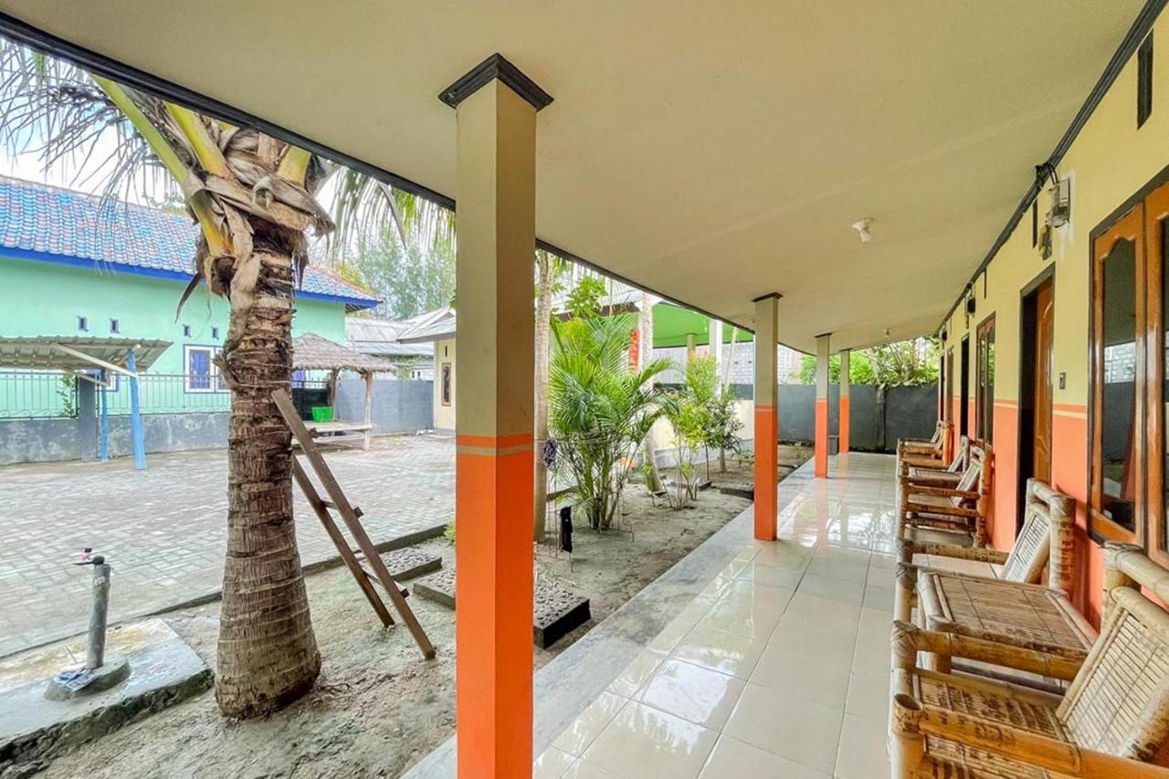 Ekas Beach Guesthouse Mitra Reddoorz ภายนอก รูปภาพ